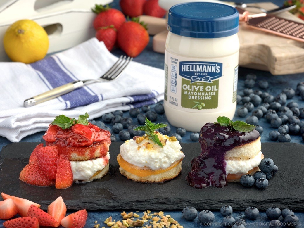 red, white, and blue pan griddled cheesecakes with lemon ricotta, blueberry balsamic, and strawberry balsamic sauce featuring hellmann's products