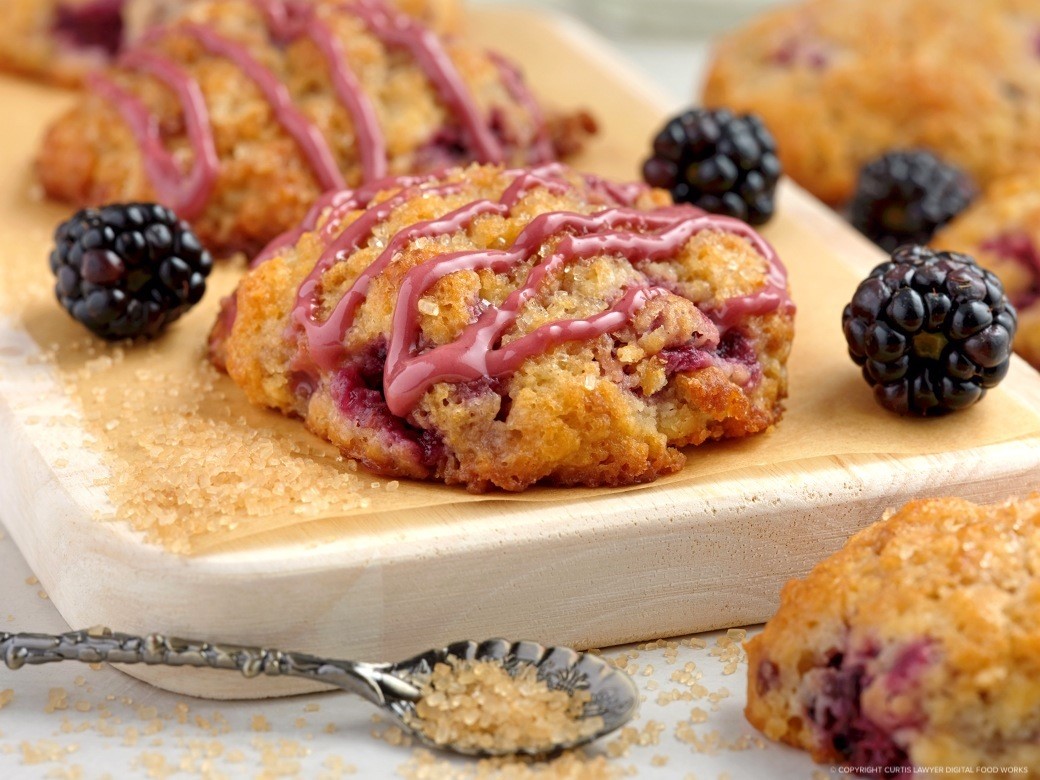blackberry scones with blackberry vanilla drizzle glaze featuring monin® products